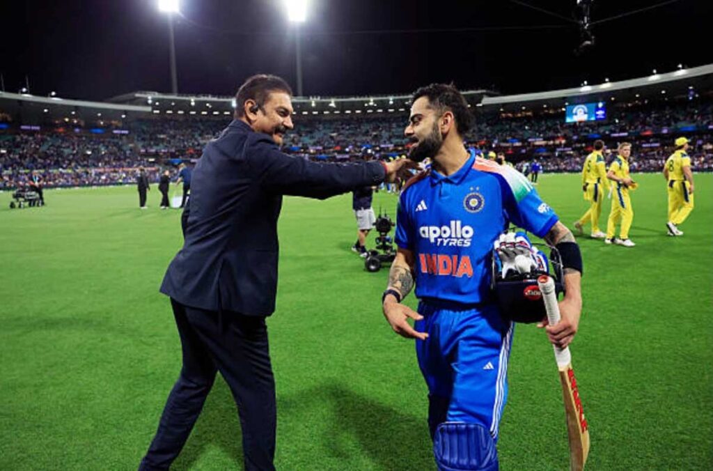 Ravi Shastri with Virat Kohli on the ground