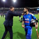 Ravi Shastri with Virat Kohli on the ground