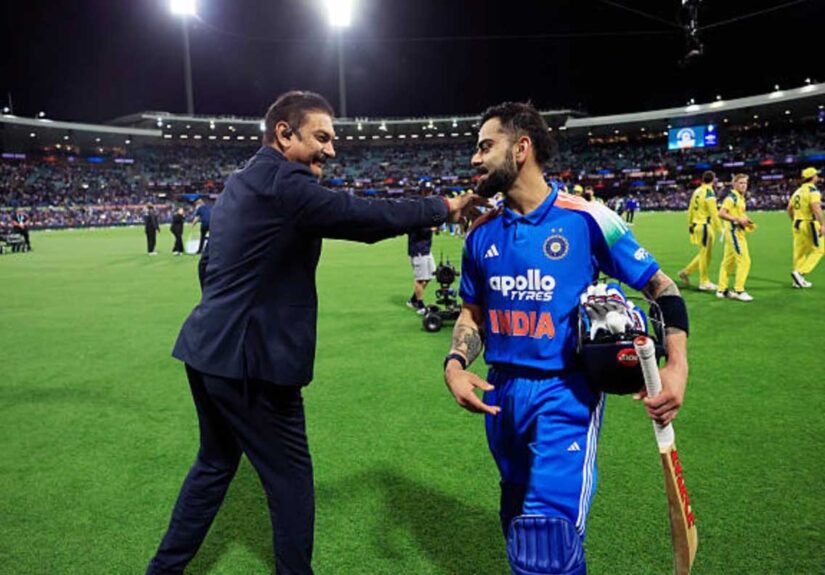 Ravi Shastri with Virat Kohli on the ground