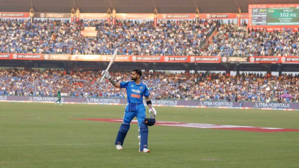 Virat Kohli walks back after making 102