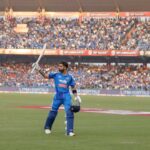 Virat Kohli walks back after making 102